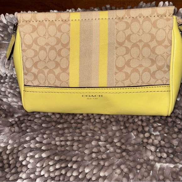 NFS Coach Legacy Stripe Signature Large Wristlet
Yellow - Picture 1 of 11